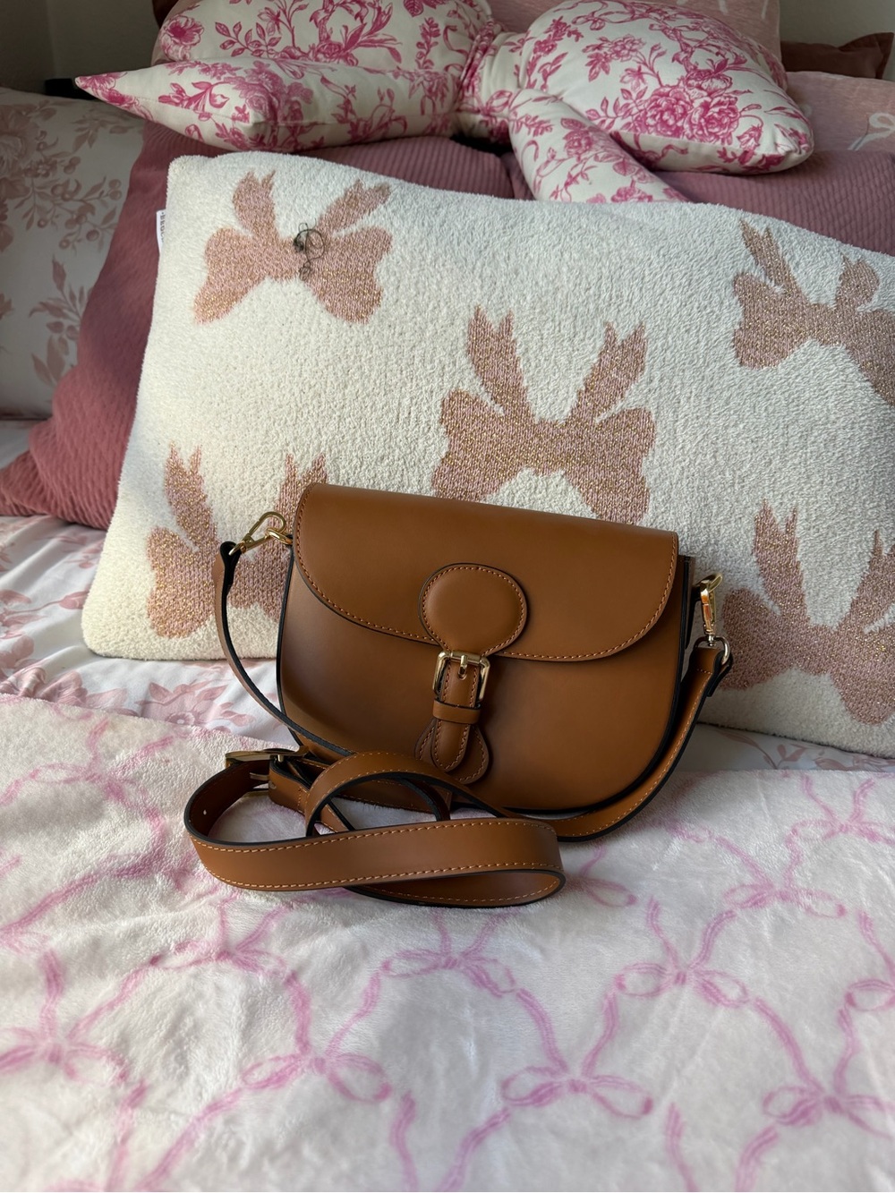 Cheval Women’s Tan Leather Saddle Bag with Buckle Detail